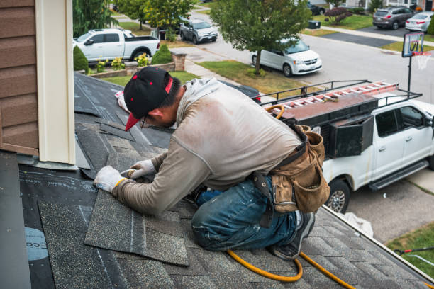Professional Roofing technician working in Casco, ME